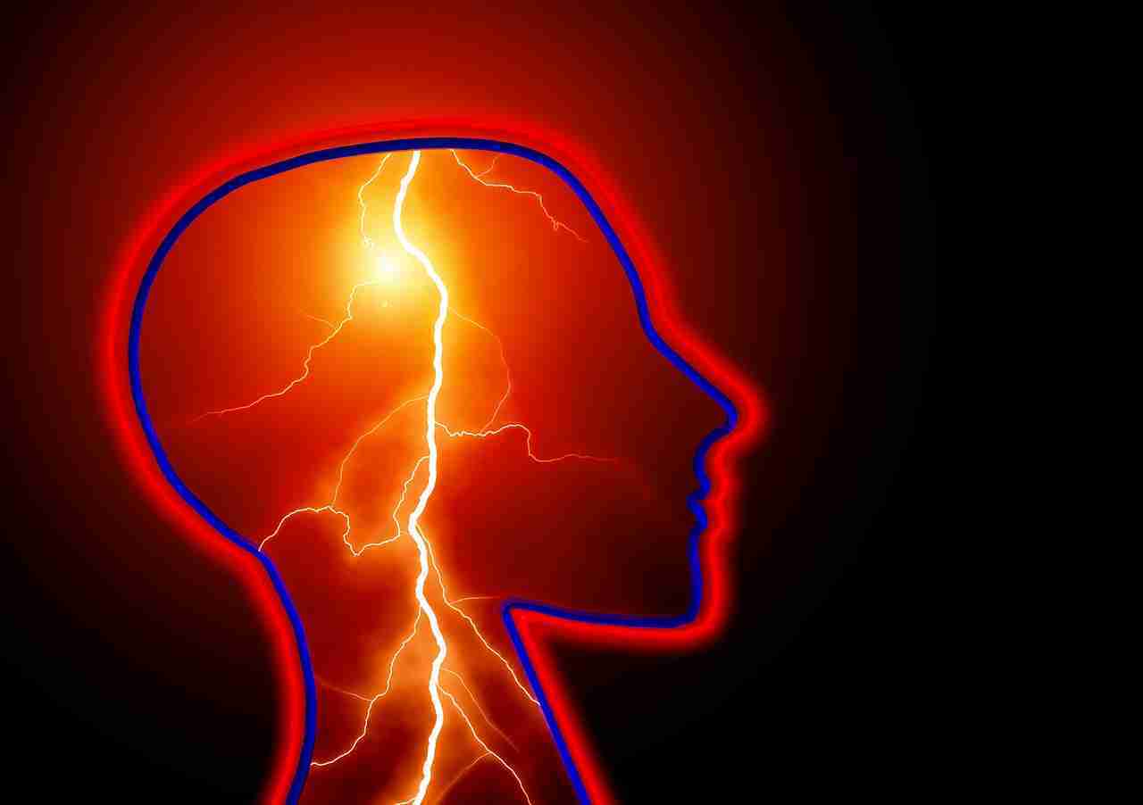 Illustration showing abnormal electrical activity in the brain representing an epileptic seizure