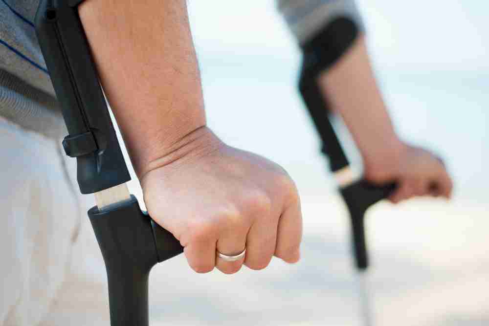 Patient using crutches following a hip replacement claim hip replacement claim