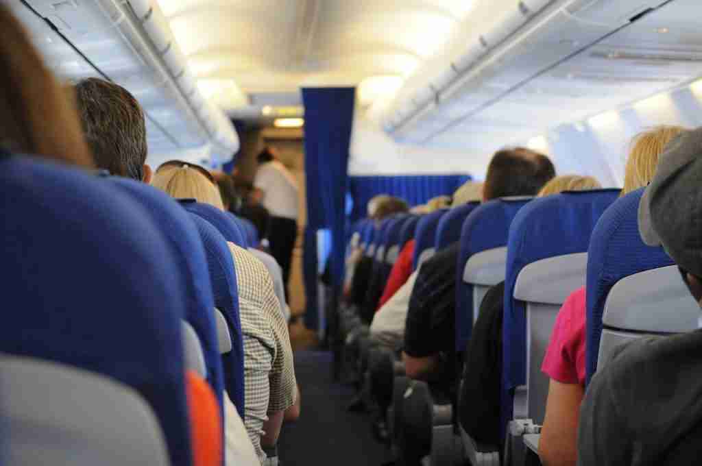 Passnegers sitting on a plane travelling to Spain. spain plane accident