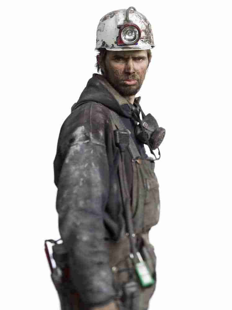 Miner covered in dust suffering a work related disease